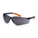 A pair of safety spectacles with orange impact-resistant lenses and adjustable side arms, for eye protection during site work.