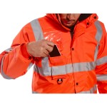 A high-visibility orange waterproof jacket featuring retroreflective tape panels, a breathable membrane, suitable for a wide range of outdoor and site work applications.