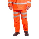 A pair of high-visibility orange trousers featuring retroreflective tape panels, a breathable membrane, suitable for a wide range of outdoor and site work applications.