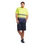 A high-visibility yellow work shirt featuring retroreflective tape panels, suitable for a wide range of outdoor and site work applications.