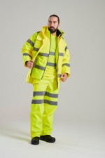 A high-visibility yellow waterproof jacket featuring retroreflective tape panels, suitable for a wide range of outdoor and site work applications.