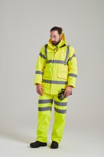 A high-visibility yellow waterproof jacket featuring retroreflective tape panels, suitable for a wide range of outdoor and site work applications.