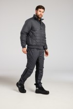 A grey padded jacket featuring a warm thermal lining, suitable for a wide range of outdoor and site work applications.