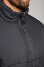 A grey padded jacket featuring a warm thermal lining, suitable for a wide range of outdoor and site work applications.