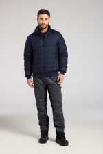 A navy blue padded jacket featuring a warm thermal lining, suitable for a wide range of outdoor and site work applications.