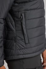 A women's grey padded jacket featuring a warm thermal lining, suitable for a wide range of outdoor and site work applications.
