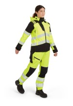 A women's high-visibility yellow jacket featuring retroreflective tape panels, suitable for a wide range of outdoor and site work applications.