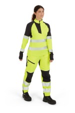 A women's high-visibility yellow work shirt featuring retroreflective tape panels, a full-length zip front, suitable for a wide range of outdoor and site work applications.