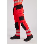 A pair of high-visibility yellow trousers featuring retroreflective tape panels, functional pockets, suitable for a wide range of outdoor and site work applications.