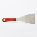 A 75mm flexible filling knife with a thin steel blade and a painted wooden or plastic handle, for applying and smoothing filler and caulk.