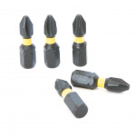 Five black and yellow screwdriver bits are arranged on a white surface; three stand upright while two lie flat in the foreground.,