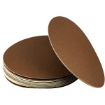 A stack of round, brown sandpaper discs with one disc leaning upright against the stack, all on a white background.