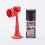 A red plastic air horn with a separate black canister labeled FIRECHIEF GAS HORN is displayed against a plain white background.,