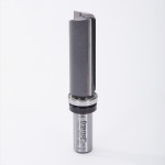 A cylindrical industrial router bit with a smooth silver base and a sharp-edged, dark gray cutting blade, marked with brand and measurement details, standing upright on a white background.