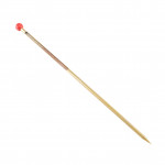 A single wooden knitting needle with a pointed tip at one end and a red round cap at the other end, isolated on a white background.