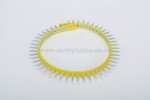 A yellow plastic strip forms a circle, holding evenly spaced silver screws pointing outward, resembling a crown or gear, on a plain white background.