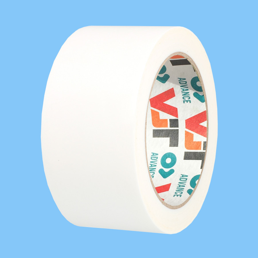 A roll of white adhesive tape with colorful text and patterns on the inner core, set against a solid light blue background.