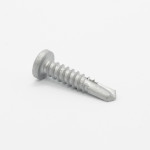 A single silver self-tapping screw with a flat, round head and a pointed, notched tip lies on a plain white background.