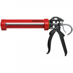 A red and black caulking gun with a metal trigger and handle, branded “Fischer,” designed for applying sealant from cartridges.