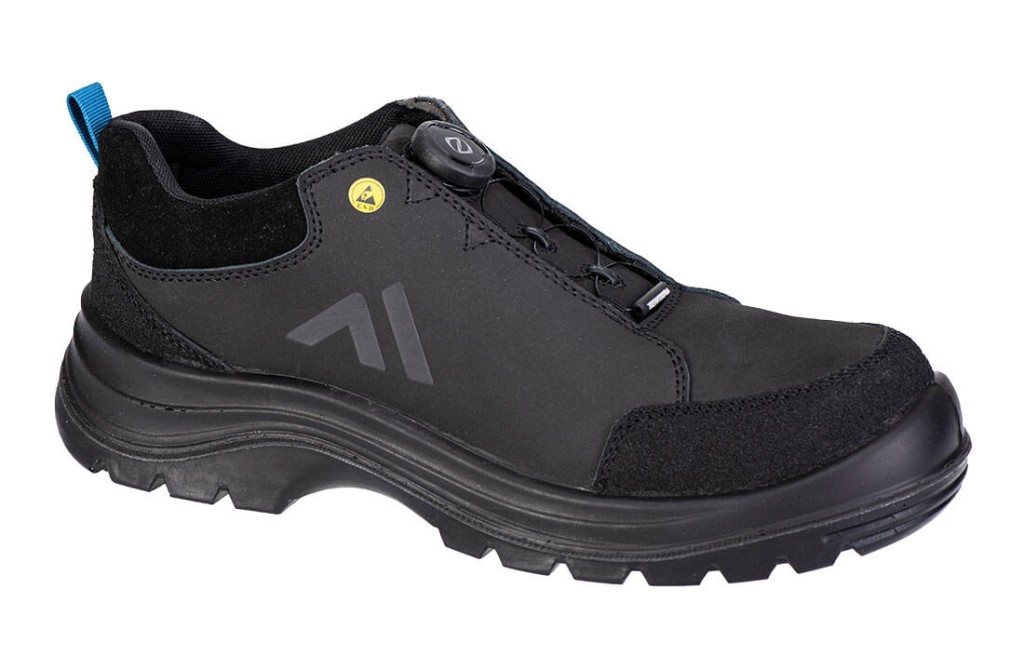 A black safety trainer with a composite toecap, a cushioned insole, and a lightweight anti-slip sole, suitable for lighter-duty site work.