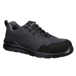 A grey safety trainer with a composite toecap, a cushioned insole, and a lightweight anti-slip sole, suitable for lighter-duty site work.