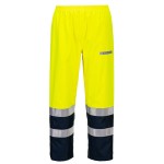 A pair of high-visibility yellow trousers featuring retroreflective tape panels, flame-resistant fabric, suitable for a wide range of outdoor and site work applications.