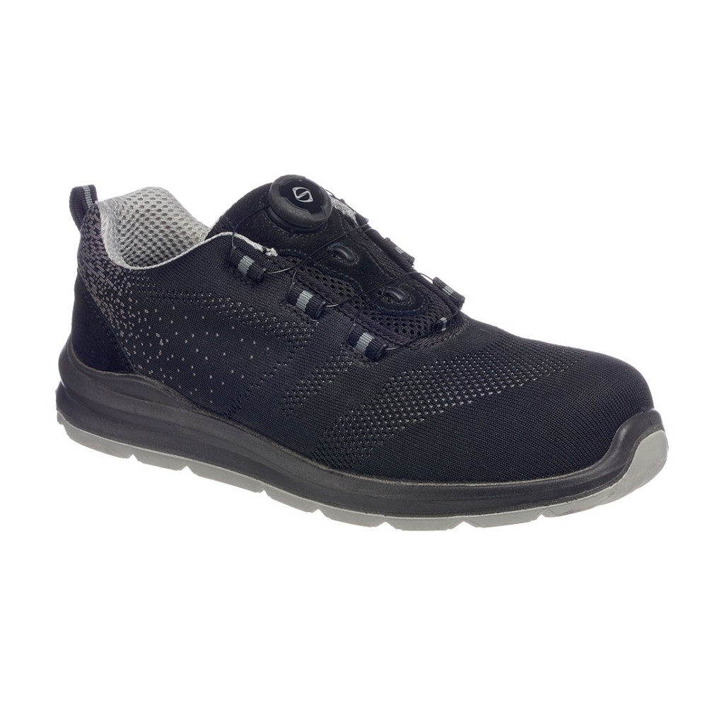 A black safety trainer with a composite toecap, a cushioned insole, and a lightweight anti-slip sole, suitable for lighter-duty site work.