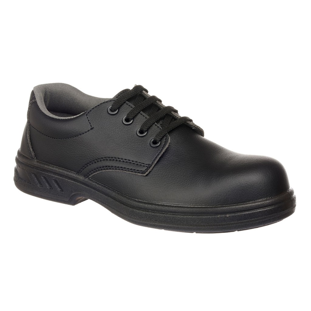 A black safety trainer with a composite toecap, a cushioned insole, and a lightweight anti-slip sole, suitable for lighter-duty site work.