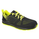 A black safety trainer with a composite toecap, a cushioned insole, and a lightweight anti-slip sole, suitable for lighter-duty site work.
