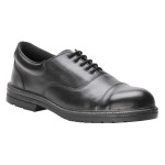 A black safety trainer with a composite toecap, a cushioned insole, and a lightweight anti-slip sole, suitable for lighter-duty site work.