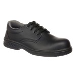 A black safety trainer with a composite toecap, a cushioned insole, and a lightweight anti-slip sole, suitable for lighter-duty site work.