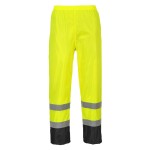 A pair of high-visibility yellow trousers featuring retroreflective tape panels, suitable for a wide range of outdoor and site work applications.