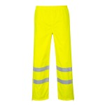 A pair of high-visibility yellow trousers featuring retroreflective tape panels, a breathable membrane, suitable for a wide range of outdoor and site work applications.