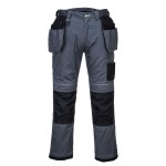 A pair of grey work trousers designed for use on construction sites and in industrial work environments.,