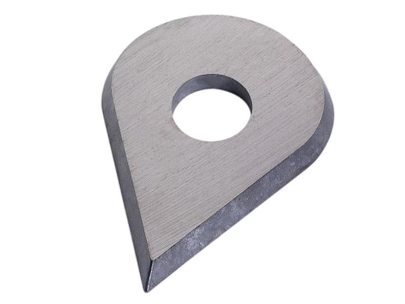 A metallic, teardrop-shaped object with a hole near the top and a sharp, pointed bottom edge. The surface appears smooth, and the object is shown against a white background.