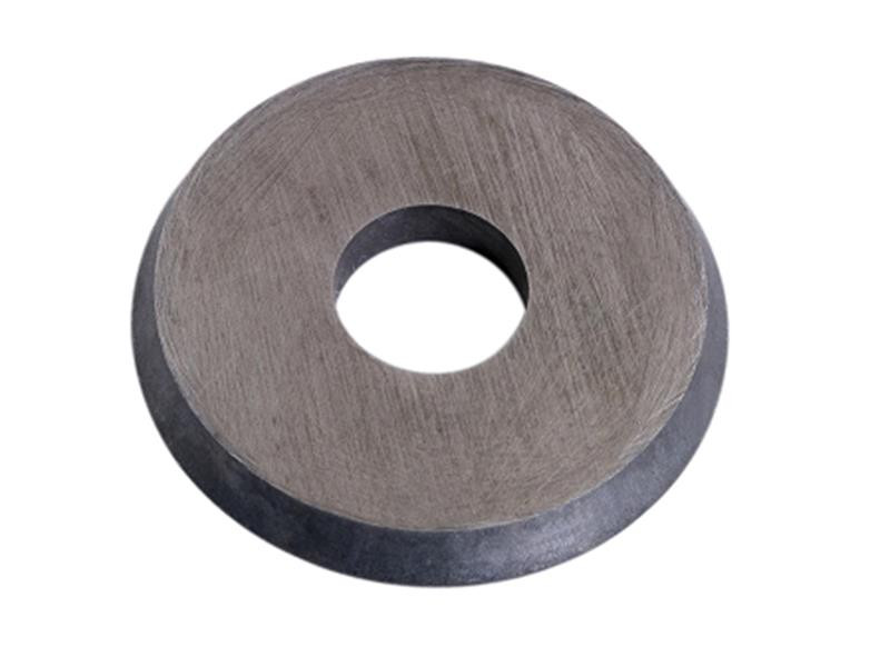 A circular, flat, metallic object with a large hole in the center, resembling an industrial washer or disk-shaped component, photographed on a white background.