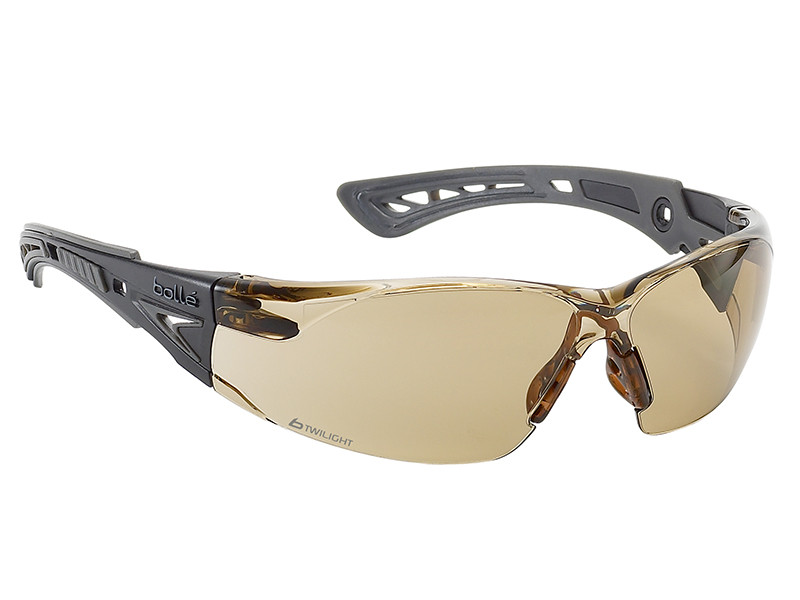 Sporty sunglasses with semi-rimless, brown-tinted wraparound lenses and a black, vented frame. The arms have cutout designs and the brand name Bolle appears on the side.