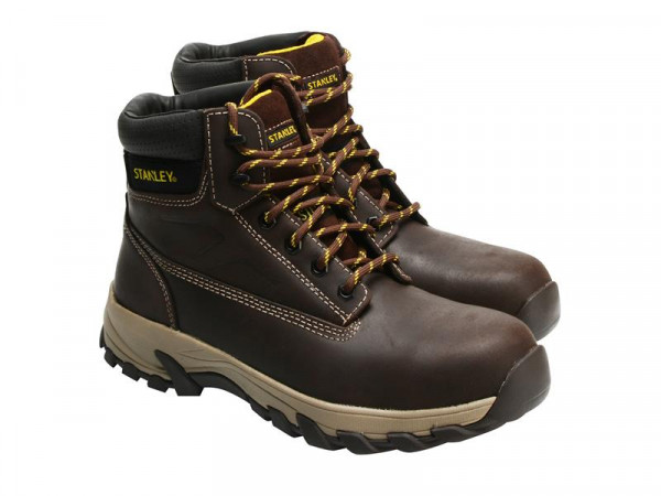 A brown composite safety boot with an anti-slip sole and padded collar, designed for comfort and protection during extended site work.