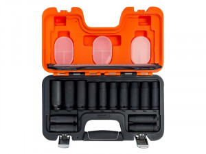 An orange tool box with black and white objects in it.,