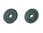 Two black circular objects with a hole in the center, resembling weight plates or washers, are placed against a white background.