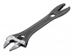 A metal adjustable wrench with a built-in scale for measurements and a jaw that can be widened or narrowed, featuring a hole at the handles end and a toothed grip opposite the wrench head.