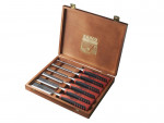 A wooden box containing six chisels with black and red handles neatly arranged inside. The box lid is open, displaying the Bahco logo on the inner side.