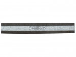 A long, rectangular metal strip with a shiny silver center section embossed with the word SANDVIK. The edges are darker, contrasting with the lighter middle band.