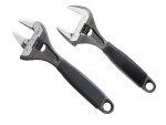 Two adjustable wrenches with black handles are shown side by side on a white background. The jaws are open at different widths, and measurement markings are visible on both wrenches.