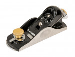 A metal hand plane with a black and silver body, brass adjustment knobs, and the brand name Bahco printed on the side. The tool is used for smoothing or shaping wood surfaces.