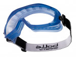 Blue safety goggles with a clear lens and a white adjustable strap featuring Bolle Safety branding in black text. The goggles are designed for eye protection and have a black buckle for securing the strap.,