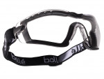 Clear protective safety goggles with a black adjustable strap, featuring the brand name Bollé in white text. The goggles have a contoured frame and side ventilation.