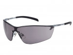 A pair of sleek, frameless sunglasses with dark, wraparound lenses, thin metal arms, and black plastic tips. The brand name Bolle is visible on the arm.