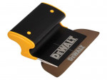 A black and yellow DEWALT-branded hand tool with a brown, curved blade and ergonomic grip, designed for scraping or smoothing surfaces.