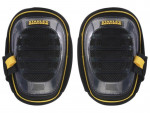 A pair of foam-padded knee pads with adjustable straps, designed to protect the knees during kneeling work.